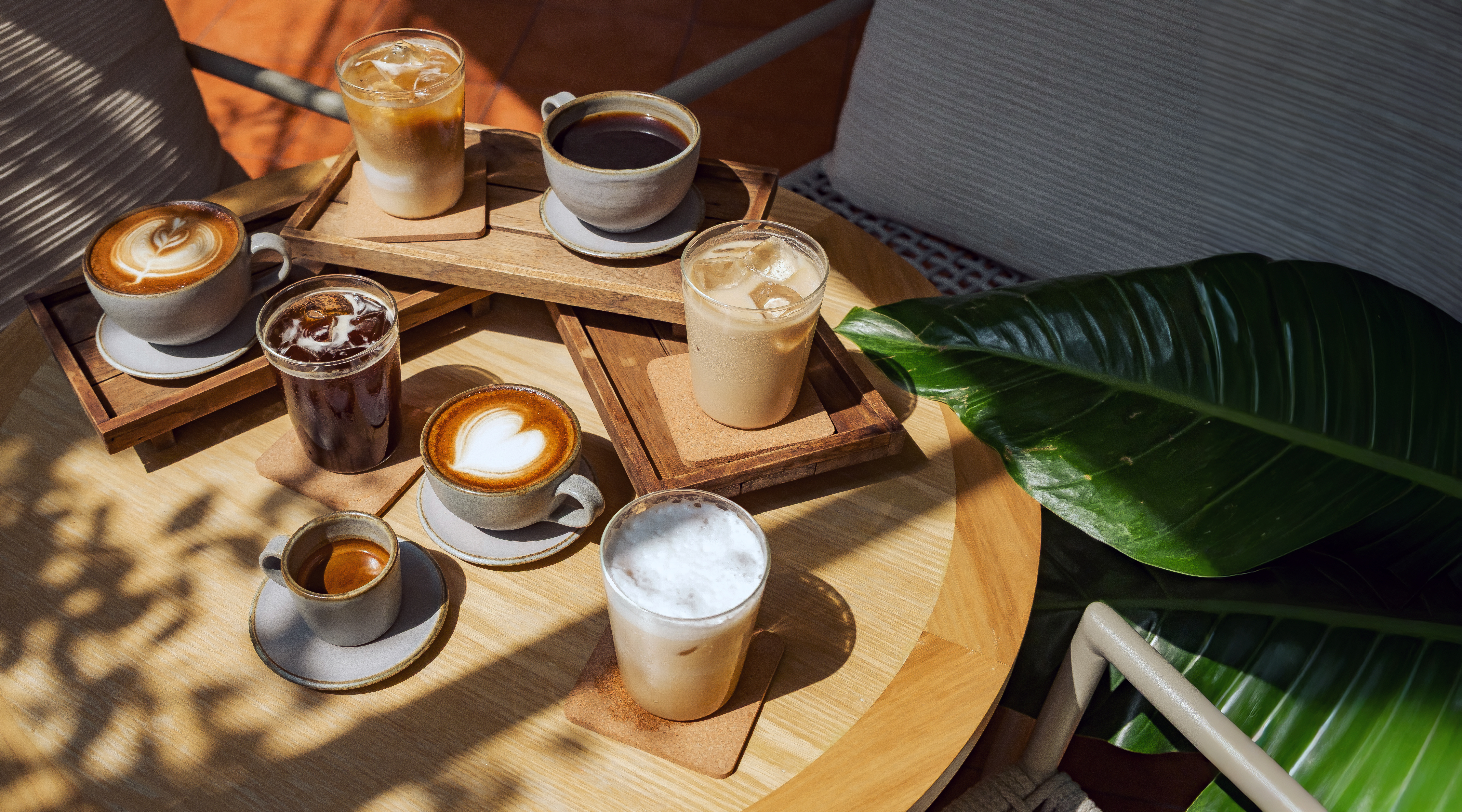 coffee shop with barista using coffee equipment